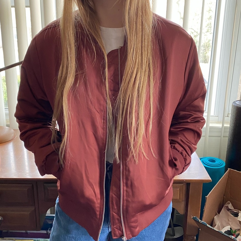 Rust colored bomber jacket